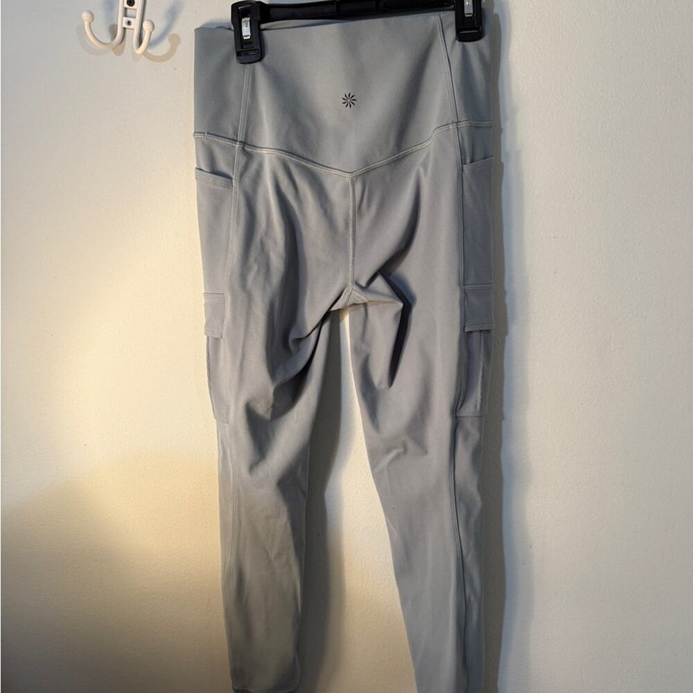 Athleta Women’s SP Salutation Cargo 7/8 Legging Athleisure Gym Yoga Fitness